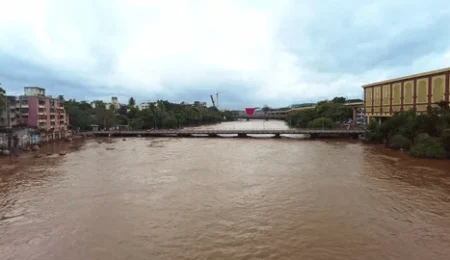Polluted stretch of Mula-Mutha River with plastic waste