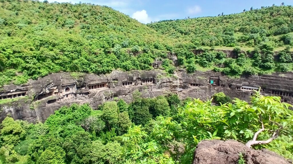 Panoramic view of India Ajanta Caves carved into the cliffside