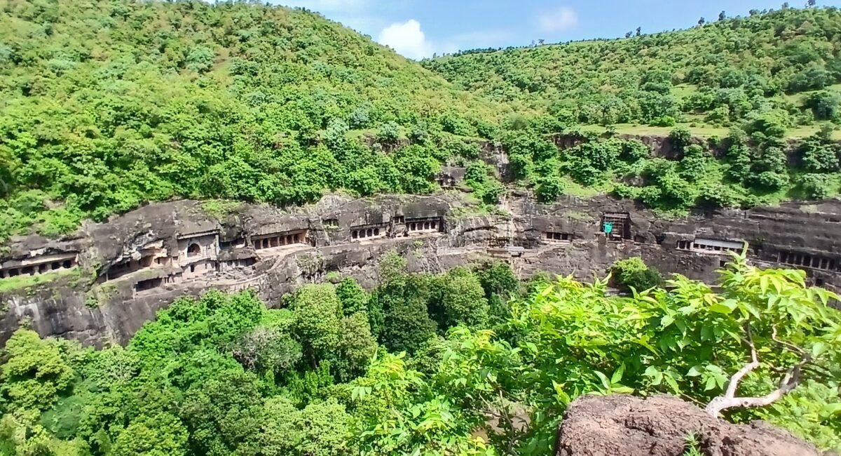 India Ajanta Caves: A Timeless Journey into Buddhist Art and Architecture 1 Panoramic view of India Ajanta Caves carved into the cliffside