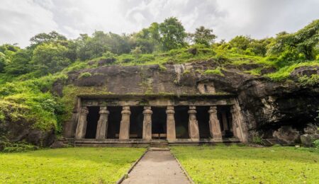 Elephanta Caves: Unveiling the Rock-Cut Marvels of Gharapuri Island 12 Panoramic view of the Trimurti Shiva relief inside Elephanta Caves on Gharapuri Island
