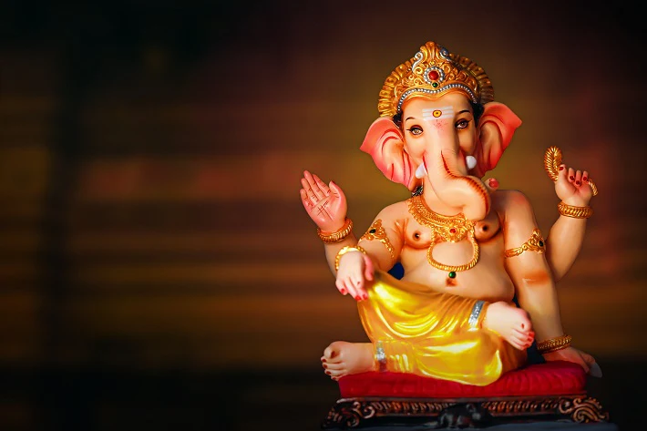 Devotees performing Ganesh Chaturthi Pooja rituals