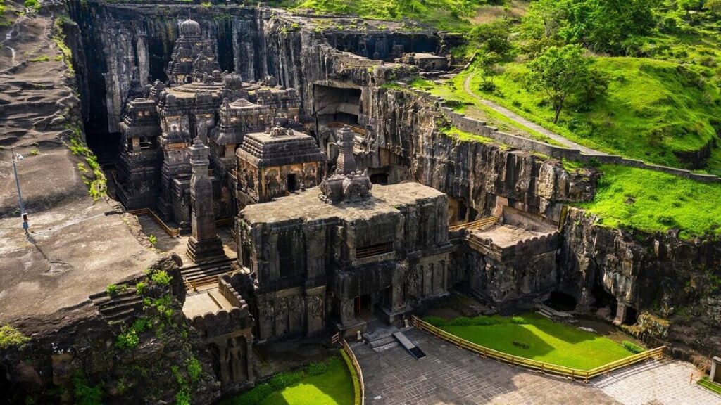Panoramic view of Ellora Caves in India carved into basalt cliffs