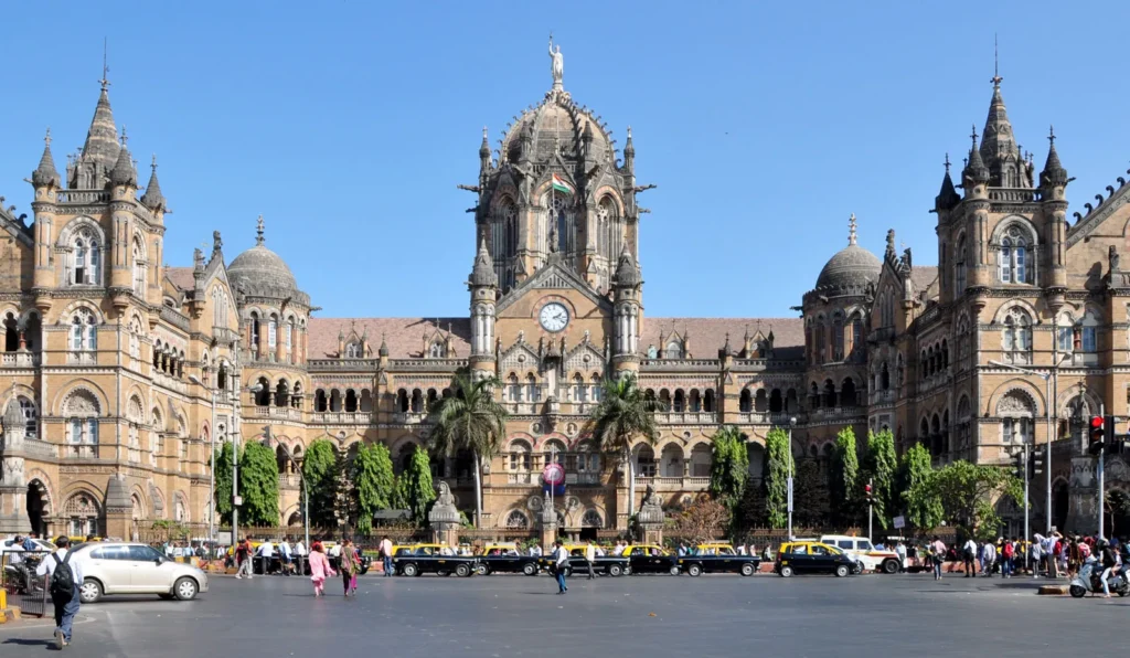 Victorian Gothic main dome of Chhatrapati Shivaji Terminus Mumbai illuminated at night