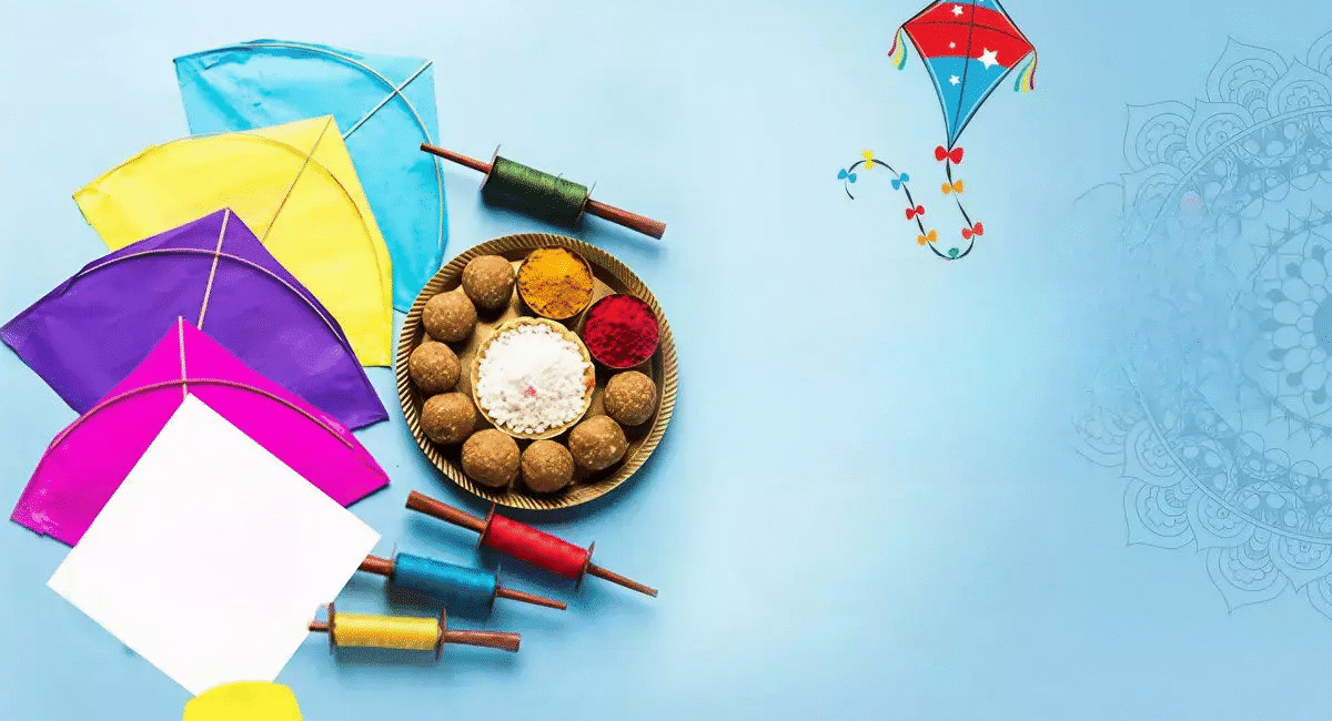 Why We Celebrate Makar Sankranti? Spiritual & Scientific Meaning 1 Colorful kites soaring in the blue sky during Makar Sankranti celebrations in Gujarat