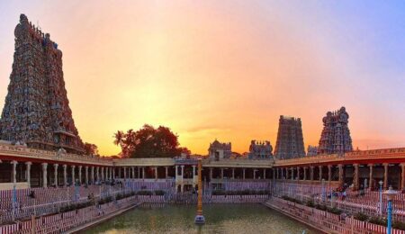 Meenakshi Amman Temple gopuram with intricate Dravidian sculptures